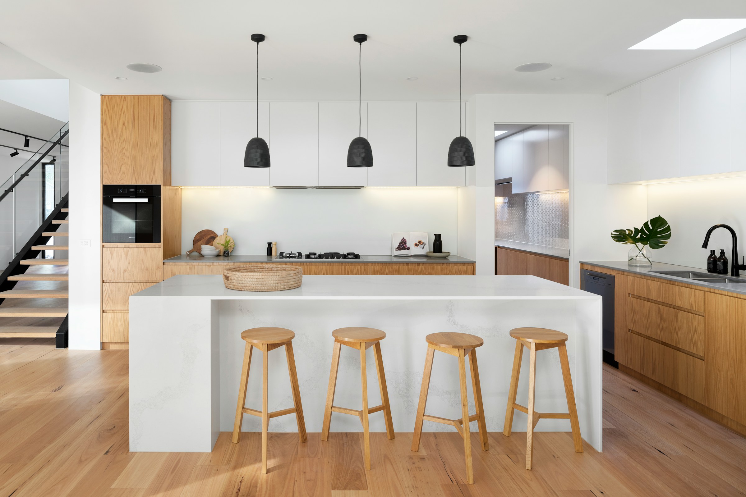 Modern Calgary kitchen with wrapped two-tone cabinets